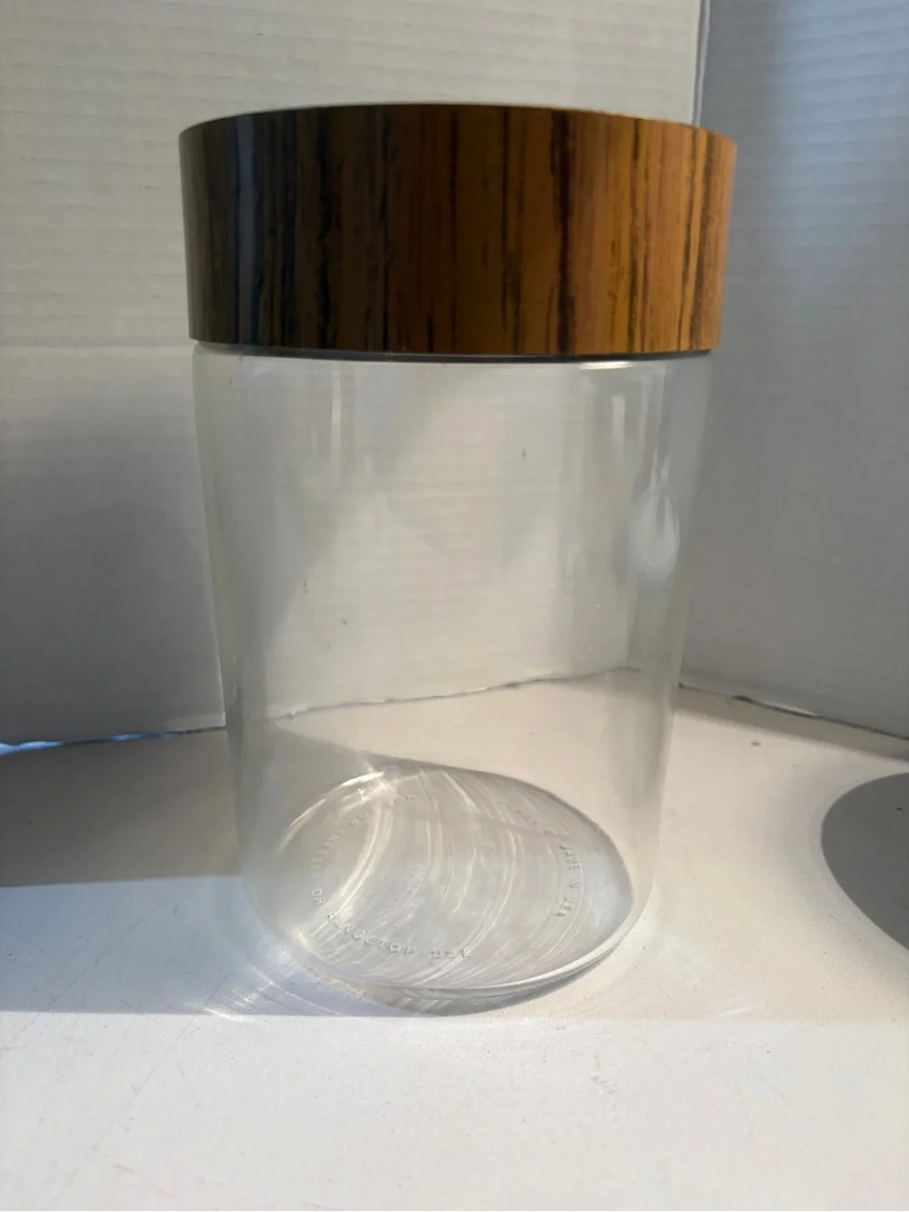 Vintage 1970s Pyrex canister with wood grain lid 7”
